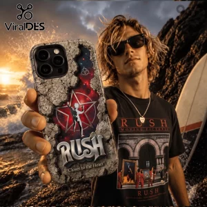 Rush band Starman logo phone case with cracked stone texture and Closer to the Heart text held against a beach background.!
