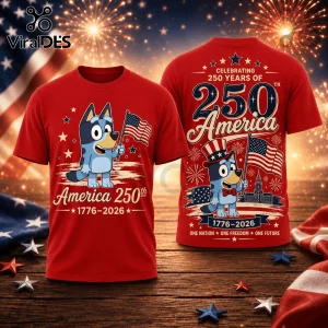 Red cotton t-shirt featuring Bluey holding a US flag with America 250th 1776-2026 text against a firework background.!