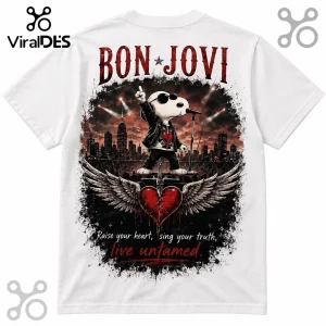 White t-shirt featuring Snoopy as a rockstar under Bon Jovi text with a heart, sword, wings, and city skyline graphic.!