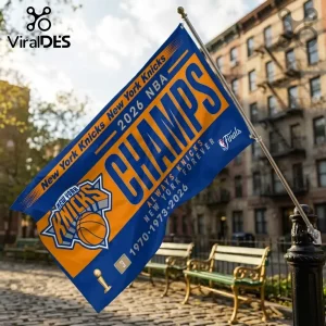 New York Knicks 2026 NBA championship flag with blue and orange fabric, team logo, and championship years on metal pole.!
