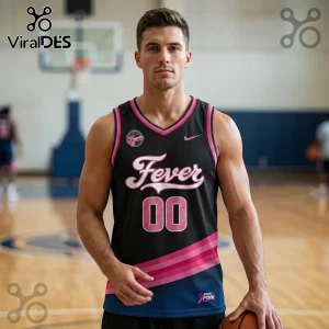 Man wearing a black basketball jersey with pink Fever lettering, number 00, and breast cancer awareness ribbons on court.!