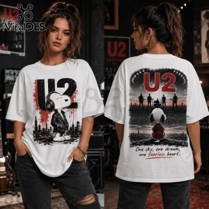 White oversized t-shirt featuring Snoopy in a leather jacket on the front and U2 band members on stage on the back.!