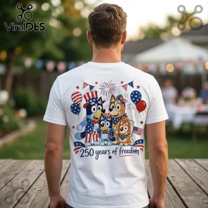 White t-shirt showing the Heeler family in patriotic attire with balloons, fireworks, and the text 250 years of freedom.!