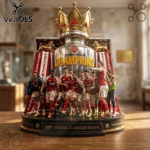 Arsenal FC 2025/2026 Premier League trophy figurine featuring team players in red kits with a gold crown on a black base.!