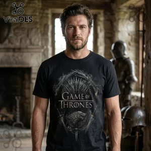 Man wearing black cotton t-shirt with Game of Thrones logo, iron throne illustration, and Stark sigil in grey metallic print.!