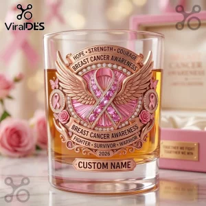 Whiskey glass with rose gold breast cancer awareness emblem, pink crystal ribbon, angel wings, and custom name plate.!