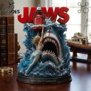 Jaws 50th anniversary resin statue featuring a great white shark, a woman, and a red Amity Island lantern on blue water.!