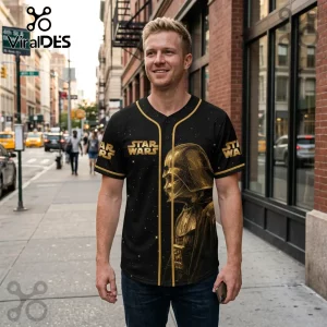 Man wearing a black Star Wars button-up baseball jersey with gold Darth Vader graphic and gold piping on a city sidewalk.!