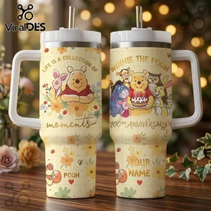 Winnie the Pooh stainless steel tumbler with handle and straw, featuring floral patterns and 100th anniversary graphics.!