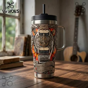 Lynyrd Skynyrd stainless steel tumbler featuring 3D-style guitar, gear, and fire graphics with Sweet Home Alabama text.!
