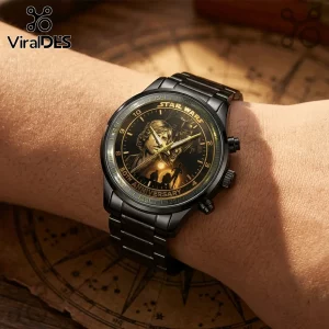 Black Star Wars 50th Anniversary wristwatch with Luke Skywalker gold dial graphic worn on a human wrist.!