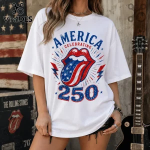 White t-shirt featuring a red, white, and blue patriotic Rolling Stones tongue logo with text America Celebrating 250.!