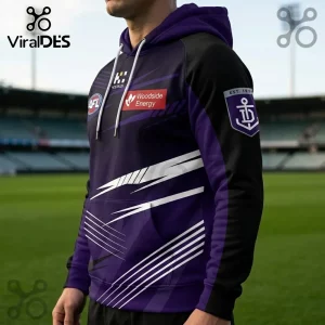 Fremantle Dockers AFL purple and black hoodie featuring Woodside Energy logo, club emblem, and white drawstring cords.!