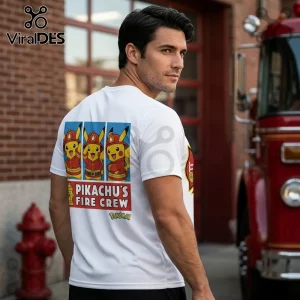 Man wearing a white t-shirt featuring three Pikachu characters in firefighter uniforms with text reading Pikachu's Fire Crew.!
