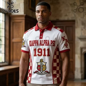 Man wearing white polo with Kappa Alpha Psi text, 1911 graphic, red checkered side panels, and fraternity crest logo.!