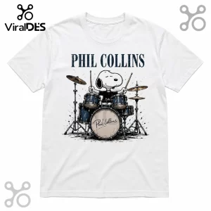White crew neck t-shirt with a graphic of Snoopy playing a drum kit under the text Phil Collins.!