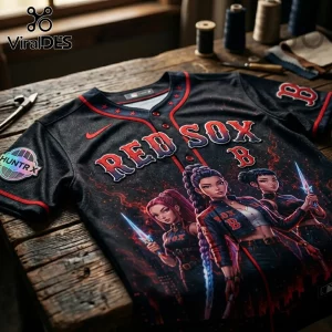 Black Boston Red Sox baseball jersey featuring anime-style female characters, red lettering, and a round HUNTRX sleeve patch.!