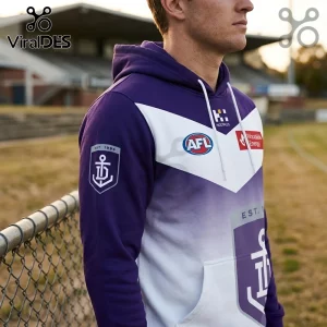 Fremantle Dockers AFL purple and white hoodie with team anchor logo, Hostplus and Woodside Energy branding, and drawstring.!