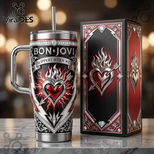 Bon Jovi Slippery When Wet stainless steel tumbler with straw, featuring a flaming heart, arrow, and silver accents.!