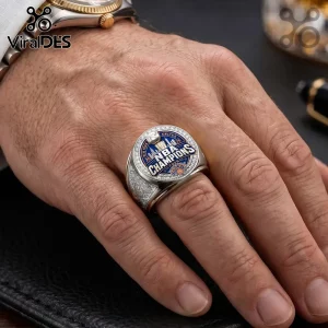 New York Knicks 2026 NBA championship ring with blue and silver enamel, white crystals, and gold trophy on silver band.!