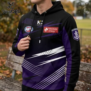Fremantle Dockers AFL hoodie in black and purple with white speed lines, team anchor emblem, and sponsor logos.!