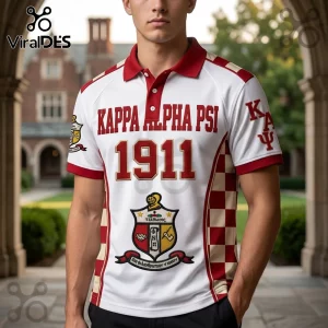 Kappa Alpha Psi polo shirt in white with crimson accents, 1911 graphic, fraternity crest, and checkered side panels.!