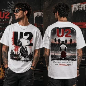 White cotton t-shirt featuring Snoopy in a leather jacket on the front and a U2 band concert graphic on the back.!