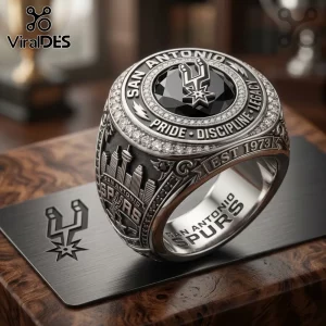 San Antonio Spurs championship-style ring with black stone, silver logo, skyline engraving, and text reading EST 1973.!