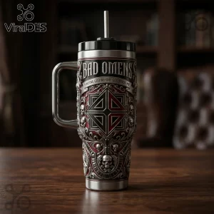 Bad Omens metal tumbler featuring intricate silver filigree, skulls, and gothic cross on a red and black background.!