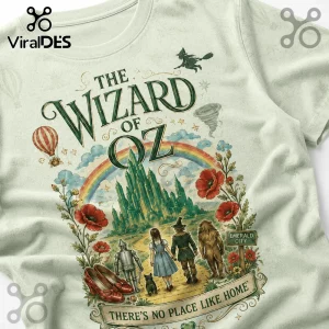The Wizard of Oz vintage-style t-shirt featuring Dorothy, the Scarecrow, Tin Man, and Lion on a yellow brick road.!