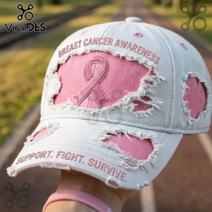 Distressed white baseball cap featuring pink fabric patches, a pink ribbon, and the text Breast Cancer Awareness.!