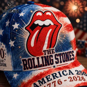 Rolling Stones tongue logo hat with American flag pattern, blue and red print, and text reading America 250 1776-2026.!