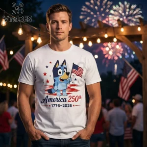 Man wearing white t-shirt with Bluey cartoon character holding an American flag and text America 250th 1776-2026.!