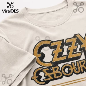 Cream colored cotton crewneck t-shirt featuring distressed metallic gold and black Ozzy Osbourne logo print.!