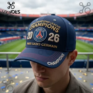 Navy blue PSG baseball cap with gold embroidery featuring UEFA Champions League 2026 text and Paris Saint-Germain crest.!