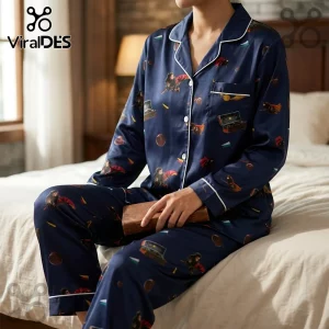 Navy blue satin pajama set with Harry Potter Quidditch patterns, white piping, button-down shirt, and long trousers.!
