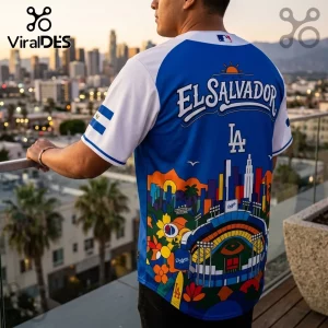 Los Angeles Dodgers baseball jersey with El Salvador text, city skyline, stadium graphic, and El Salvador flag on sleeve.!