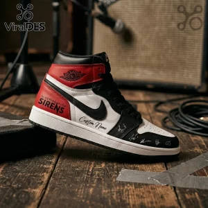 Custom Jordan 1 high-top sneaker featuring red, white, and black leather with Sleeping With Sirens text and autographs.!