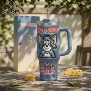 Blue Tom and Jerry embossed insulated stainless steel tumbler with straw, handle, and matching gift box on wood table.!