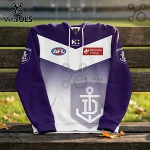 Fremantle Dockers AFL hoodie in purple and white with team anchor logo, Woodside Energy sponsor, and Est. 1994 text.!