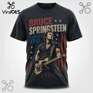 Black cotton t-shirt featuring a vintage Bruce Springsteen graphic with an American flag, text, and guitar illustration.!