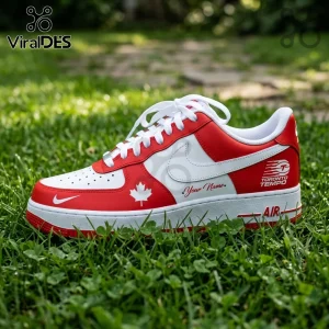 Custom red and white sneaker with Canadian maple leaf icon, Toronto Tempo logo, and personalized text on grass background.!