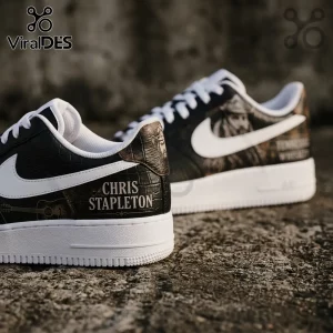 Black leather sneakers featuring Chris Stapleton branding, guitar graphics, and white Nike swoosh on white rubber soles.!