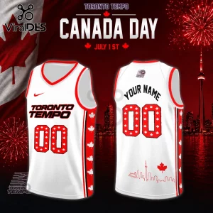White basketball jersey with red trim, Toronto Tempo branding, number 00, maple leaf patterns, and Toronto skyline graphic.!