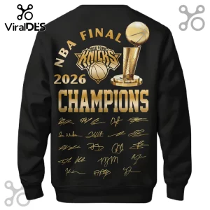 Black sweatshirt featuring gold New York Knicks 2026 NBA Finals Champions graphics, Larry O'Brien trophy, and signatures.!