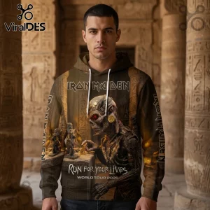 Man wearing an Iron Maiden hoodie with Egyptian tomb background, featuring Eddie mascot and Run For Your Lives 2026 text.!