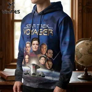 Star Trek Voyager blue pullover hoodie featuring cast portraits and the USS Voyager ship against a deep space background.!