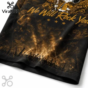 Black fabric t-shirt with gold We Will Rock You text, concert crowd silhouettes, and vintage filigree pattern.!
