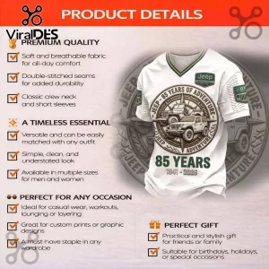 White V-neck Jeep 85th anniversary t-shirt featuring a compass graphic, off-road vehicle illustrations, and text overlays.!