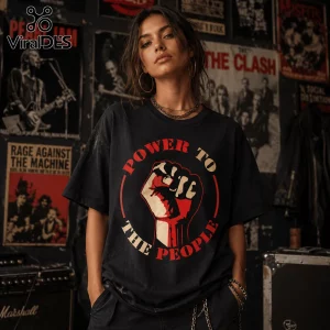 Woman wearing a black cotton t-shirt with a red and cream fist graphic reading Power To The People in a music studio.!